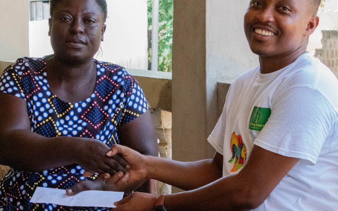 Donation to Madam Mary at Achimota, Chantan.